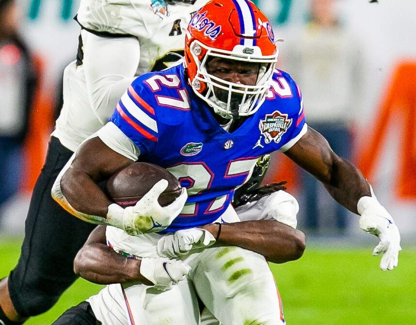 Florida Gators running back Dameon Pierce, front, runs upfield in the Dec. 23, 2022 Gasparilla Bowl against Central Florida in Tampa, Fla.