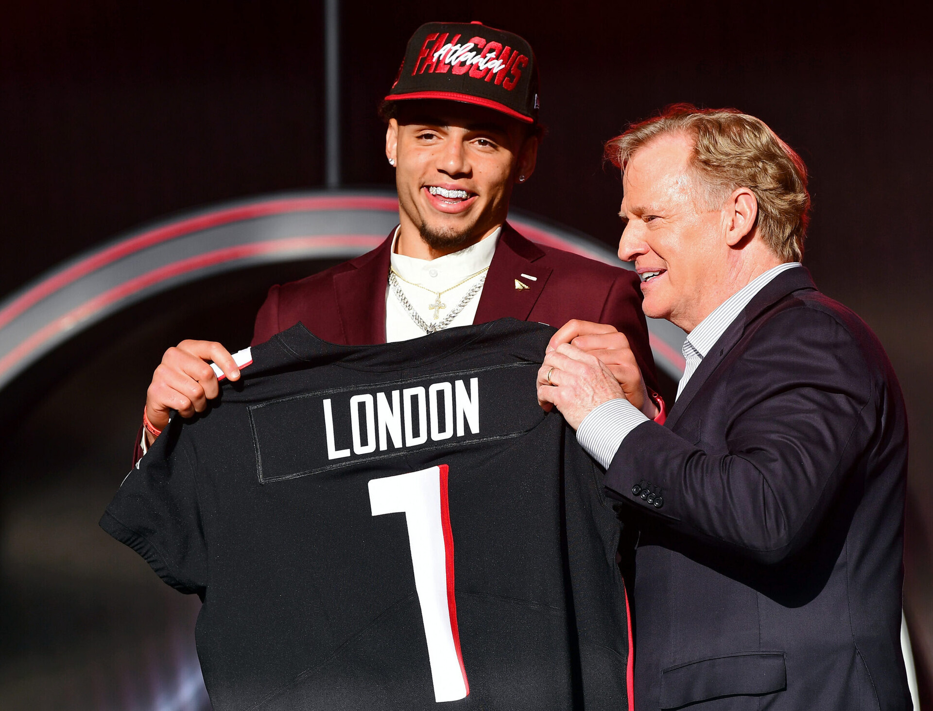 USC wide receiver Drake London, left, with NFL commissioner Roger Goodell, right, after being selected as the eighth overall pick to the Atlanta Falcons during the first round of the 2022 NFL Draft at the NFL Draft Theater on April 28, 2022.