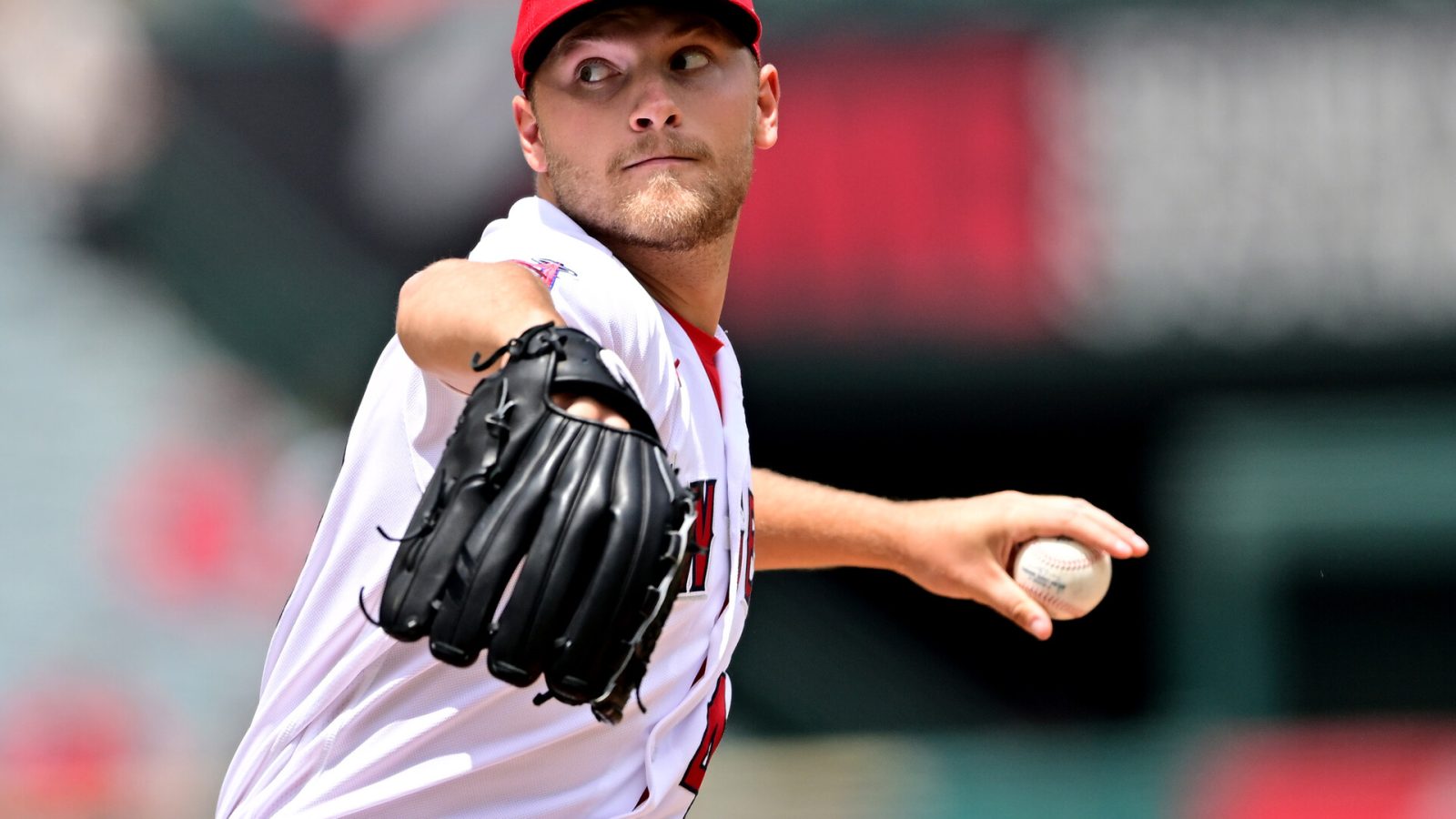 Los Angeles Angels left-handed starting pitcher Reid Detmers grips the baseball with his left hand and delivers a pitch iagainst the Cleveland Guardians