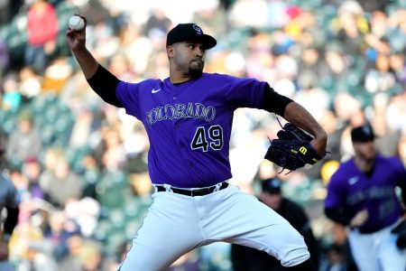 Colorado Rockies starting pitcher Antonio Senzatela (49) delivers a pitch in the first inning against the Cincinnati Reds at Coors Field.