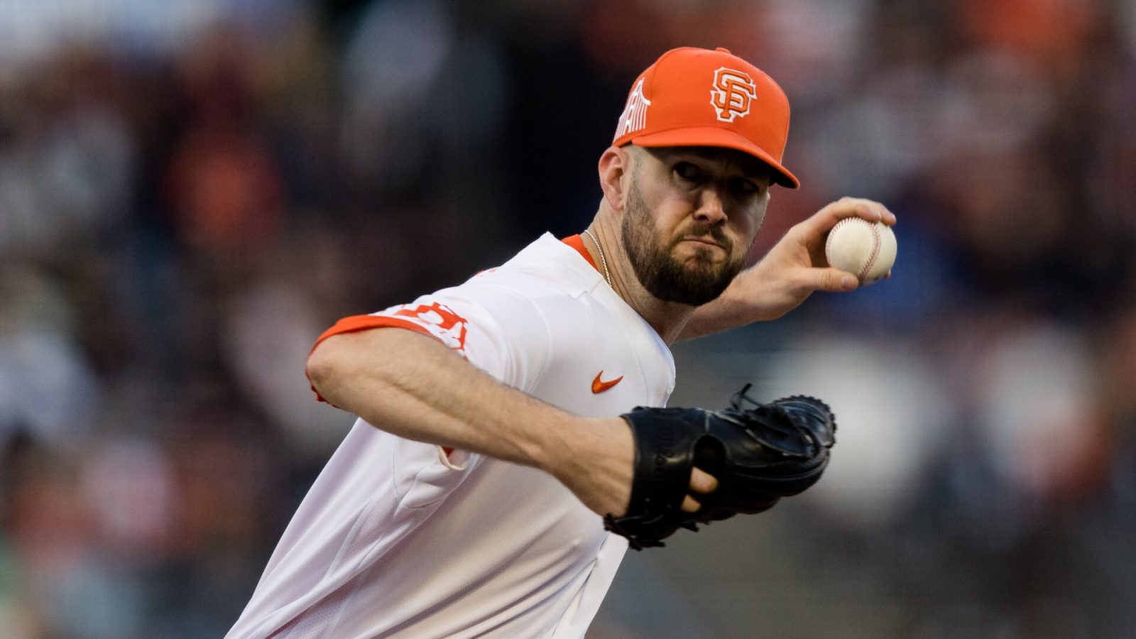 San Francisco Giants left-handed starting pitcher Alex Wood grips the baseball with his left hand and prepares to throw a pitch against the Washington Nationals