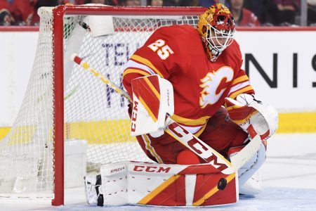 Calgary Flames goalie Jacob Markstrom stops a shot from the Dallas Stars during a 2022 Stanley Cup Playoff game