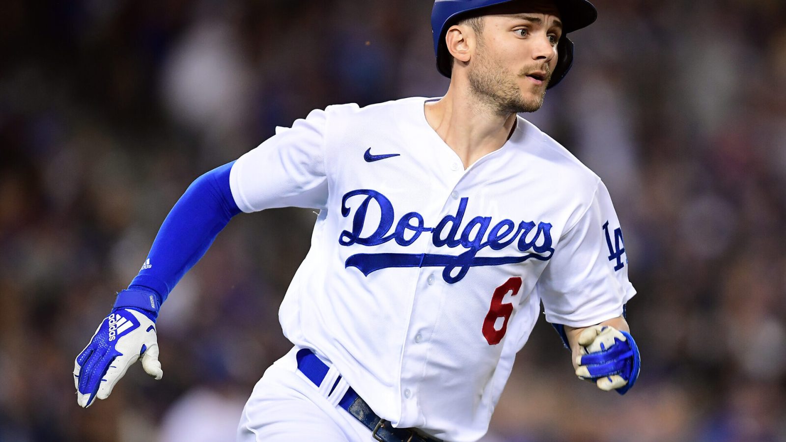 Los Angeles Dodgers shortstop Trea Turner sprints to first base and ends up on second after hitting a double against the San Francisco Giants