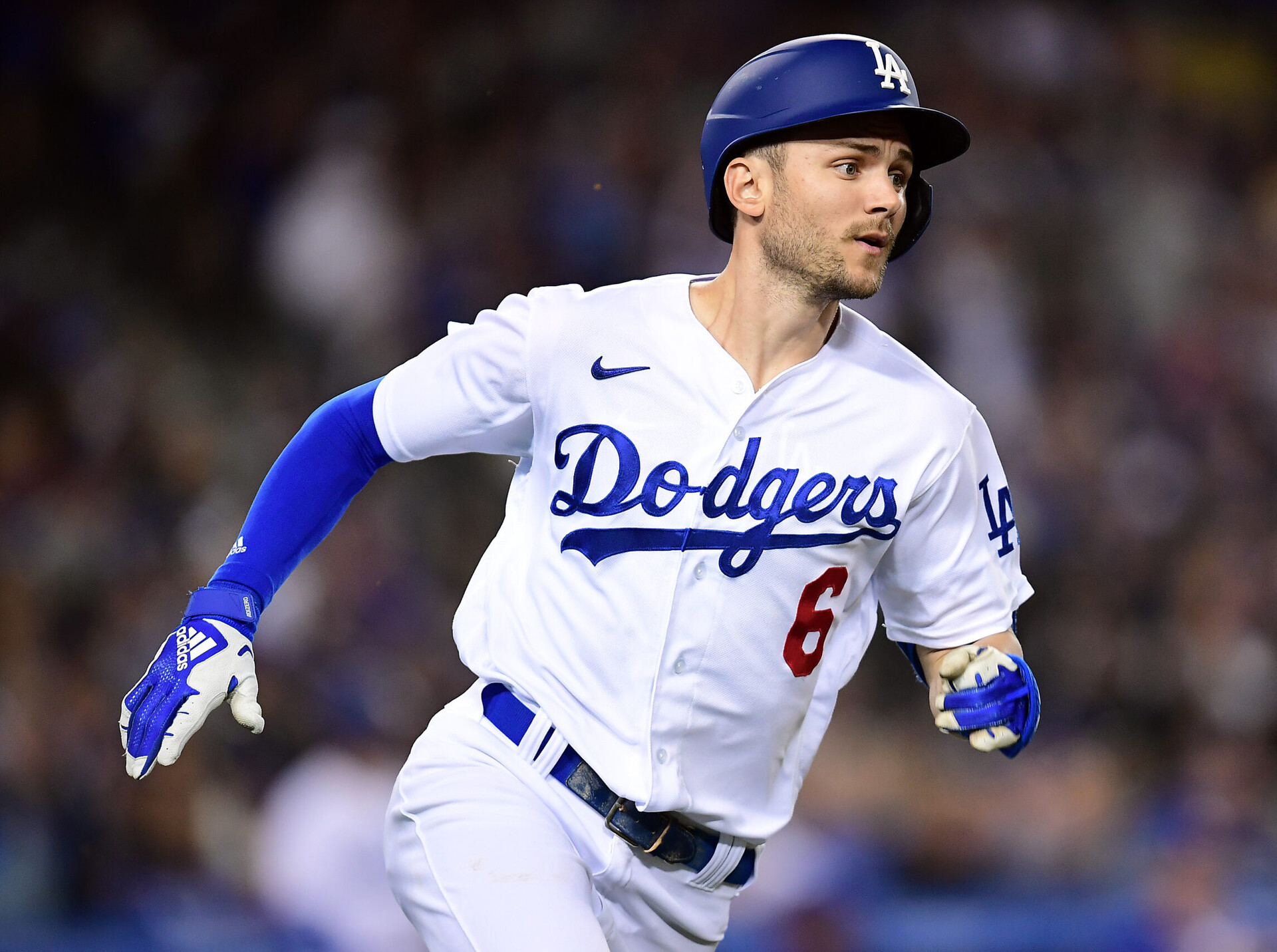 Los Angeles Dodgers shortstop Trea Turner sprints to first base and ends up on second after hitting a double against the San Francisco Giants