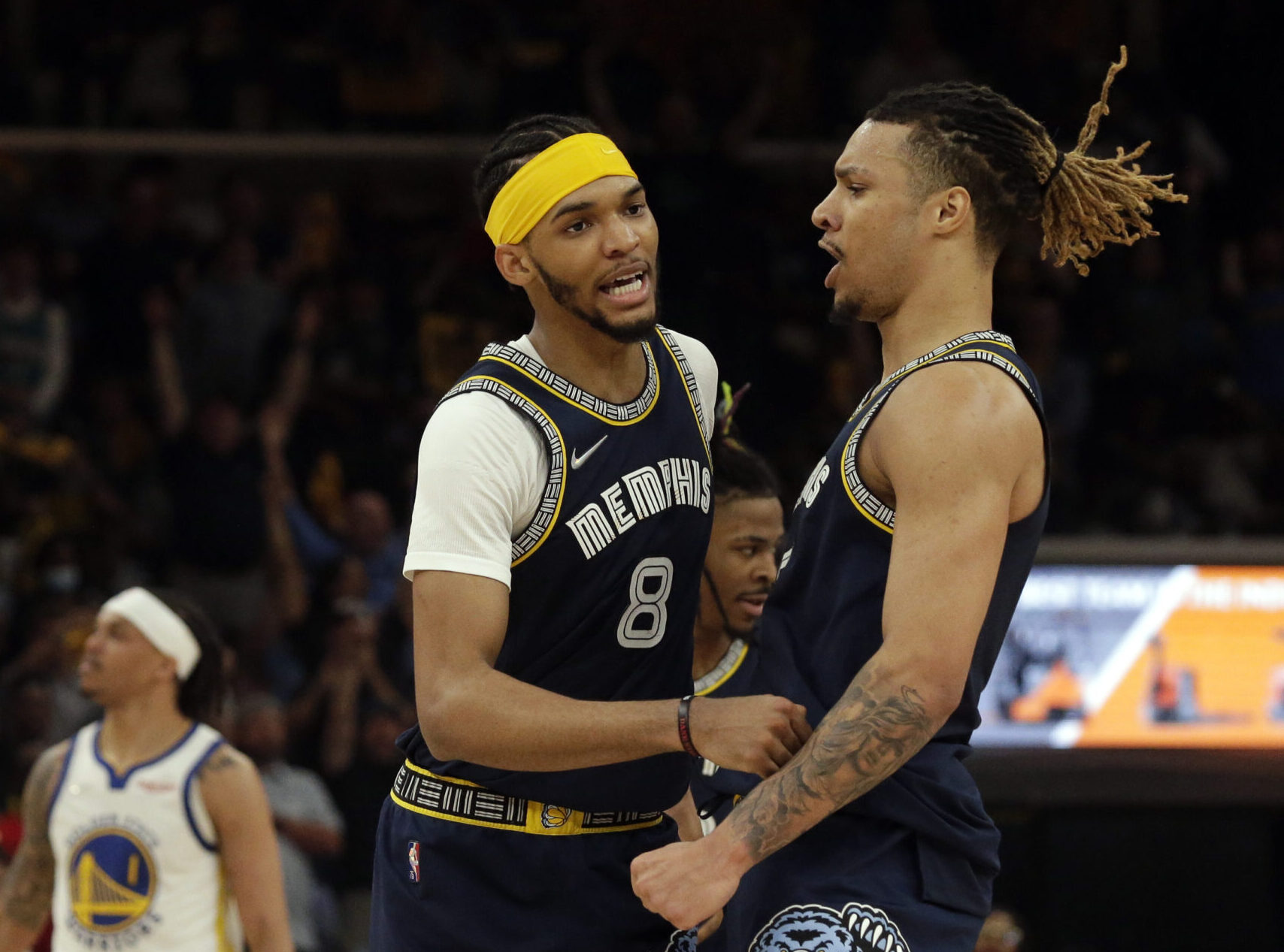 Memphis Grizzlies forward Ziaire Williams (left) and forward Brandon Clarke (right) react after basket during the second half in game two of the second round for the 2022 NBA playoffs against the Golden State Warriors at FedExForum.
