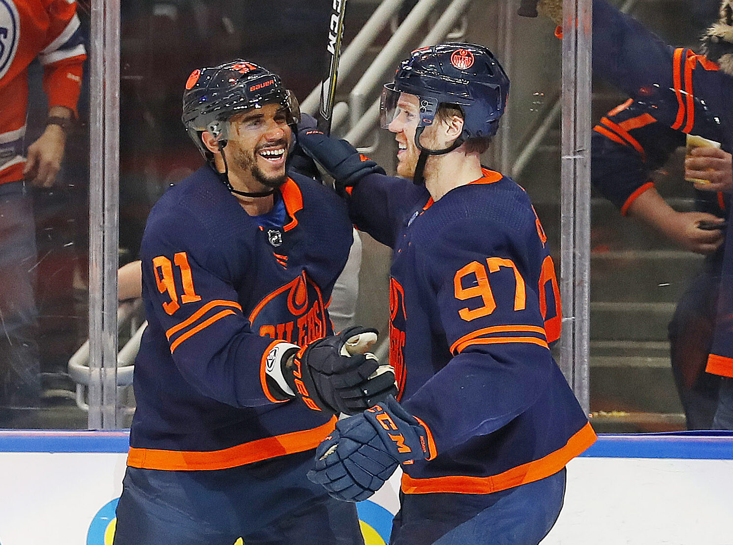Edmonton Oilers forward Evander Kane (left) celebrates with teammate Connor McDavid after Kane scored a goal during Game 2 of a Stanley Cup Playoff series