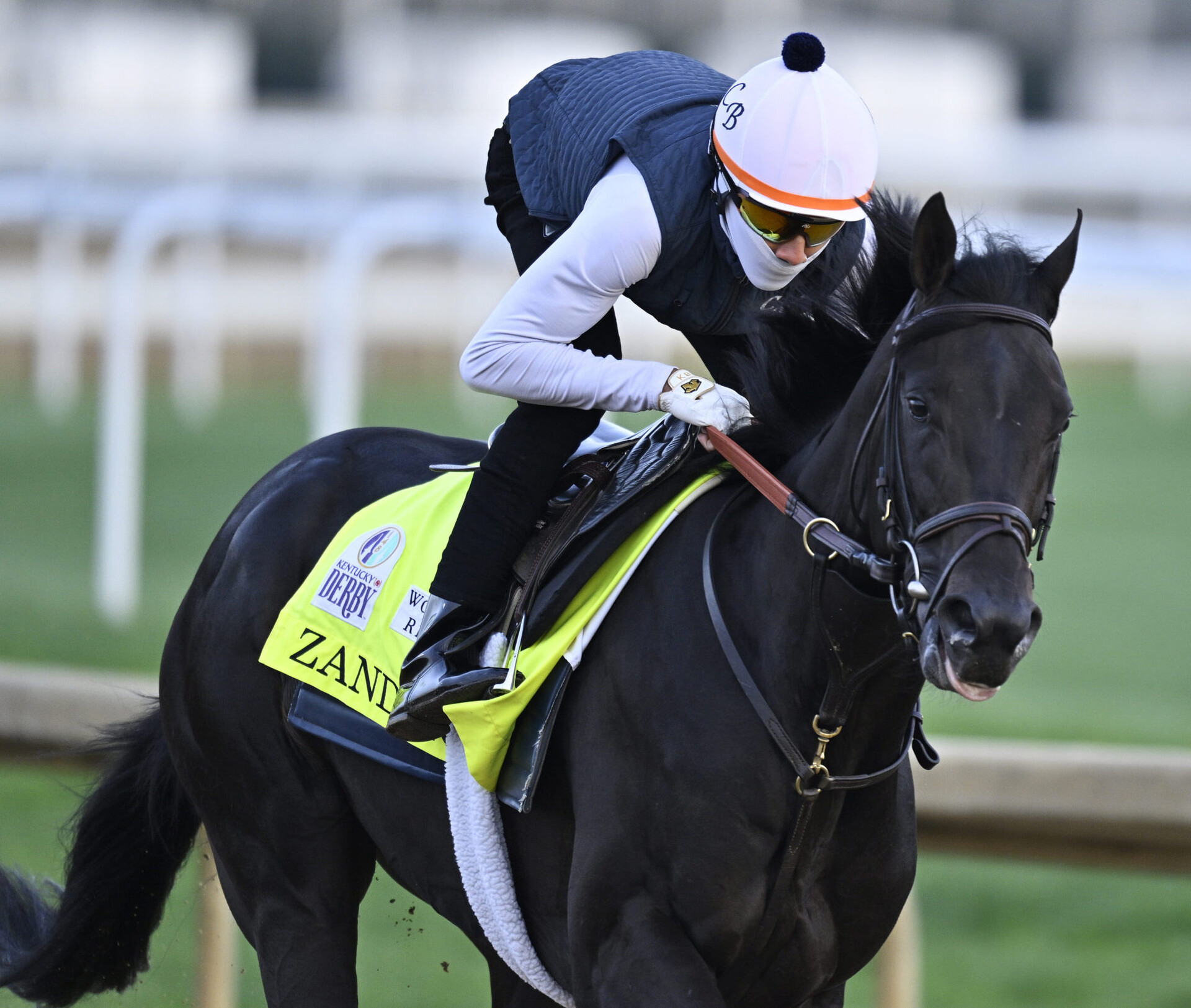 An exercise rider works Kentucky Derby entry Zandon during morning workouts at Churchill Downs.