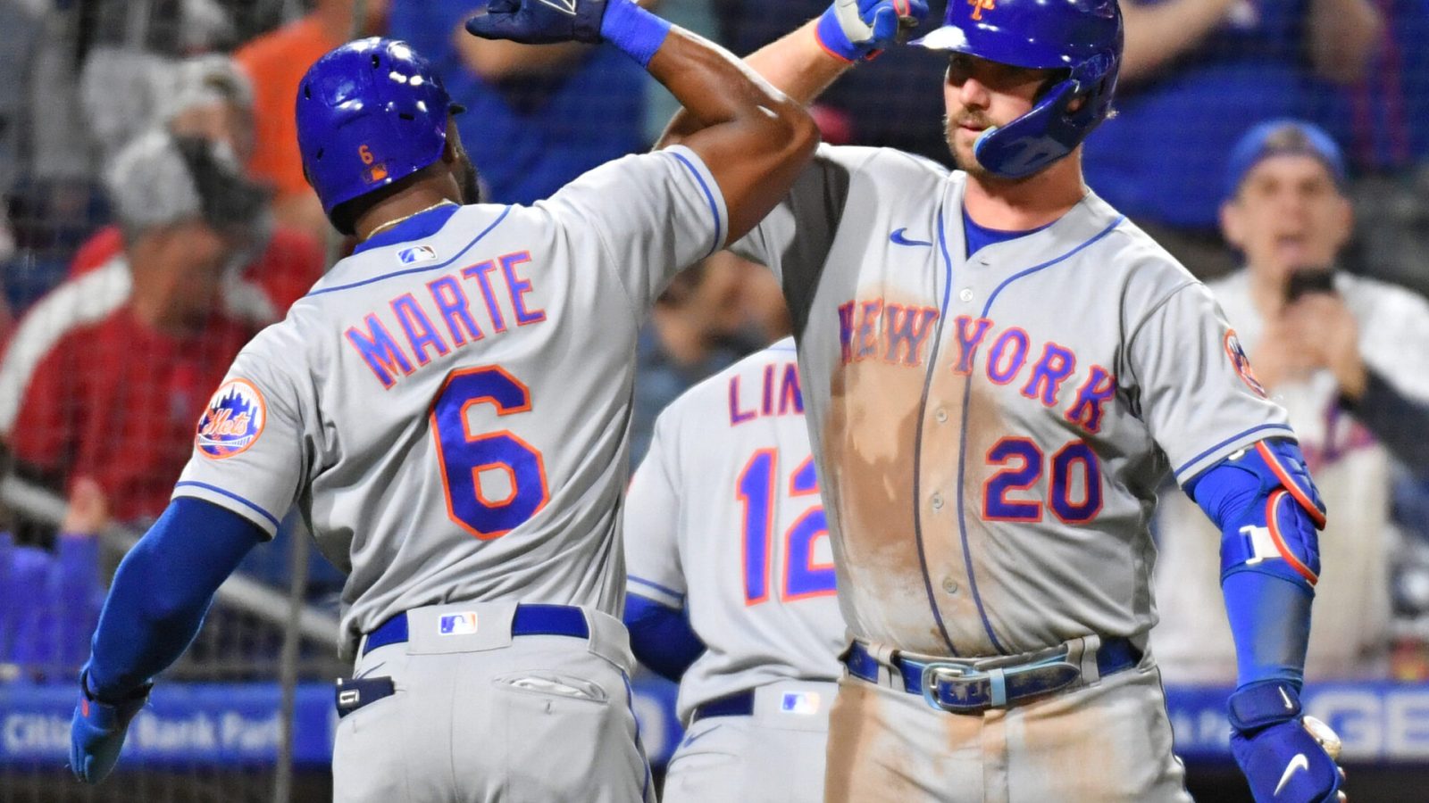 The New York Mets' Starling Marte, right, and Pete Alonso, right, celebrate against the Philadelphia Phillies during the ninth inning at Citizens Bank Park on Thursday, May 5, 2022.