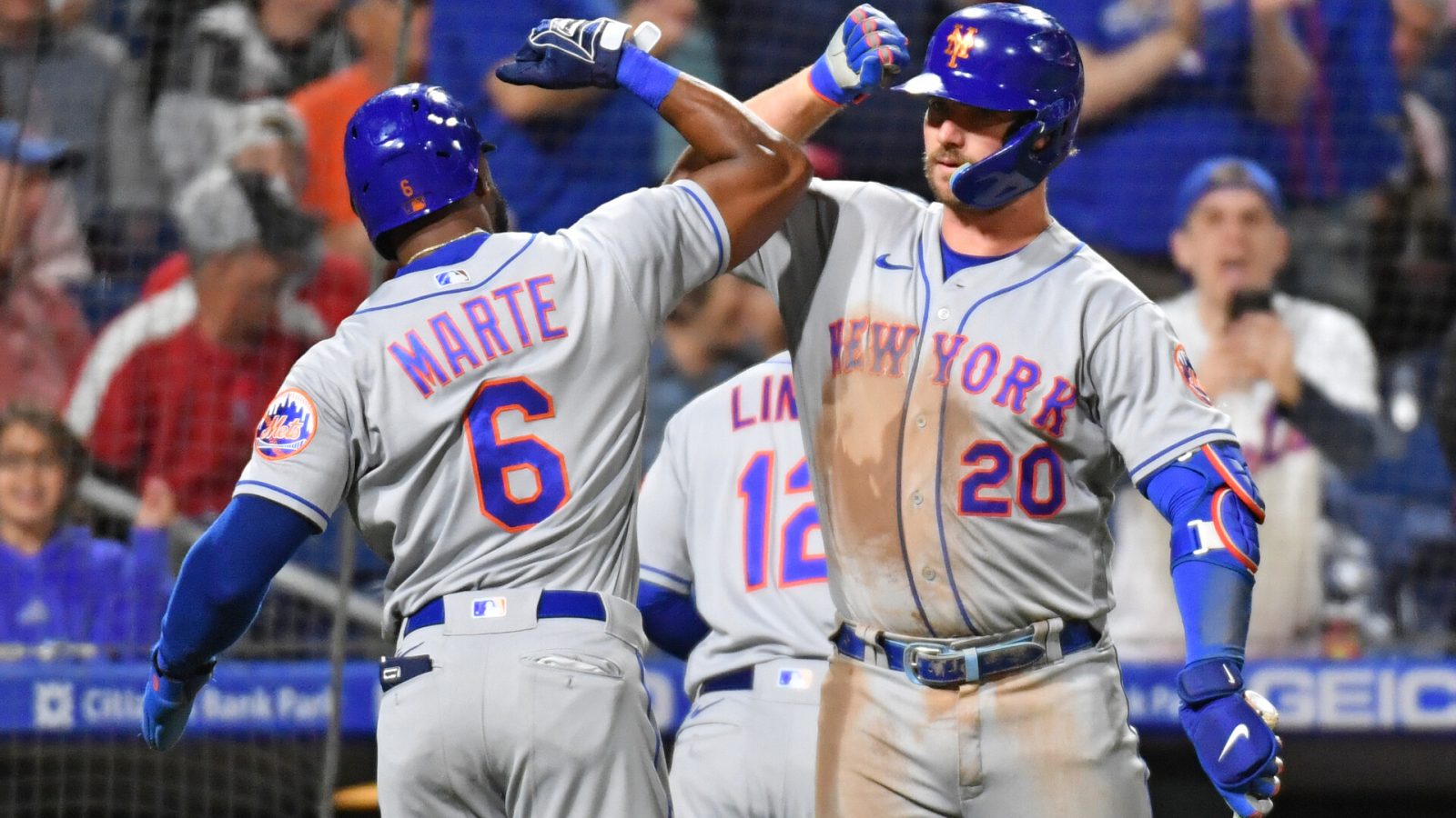 New York Mets right fielder Starling Marte (left) and designated hitter Pete Alonso (right) celebrate against the Philadelphia Phillies during the ninth inning at Citizens Bank Park.