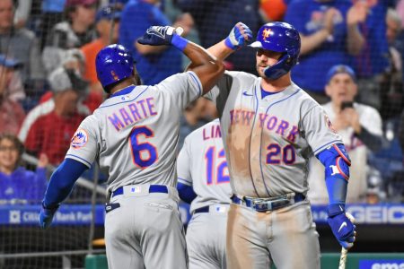 New York Mets right fielder Starling Marte (left) and designated hitter Pete Alonso (right) celebrate against the Philadelphia Phillies during the ninth inning at Citizens Bank Park.