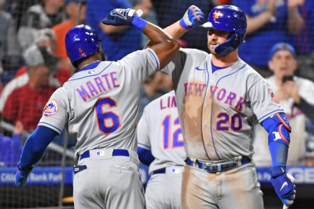 The New York Mets' Starling Marte, right, and Pete Alonso, right, celebrate against the Philadelphia Phillies during the ninth inning at Citizens Bank Park on Thursday, May 5, 2022.