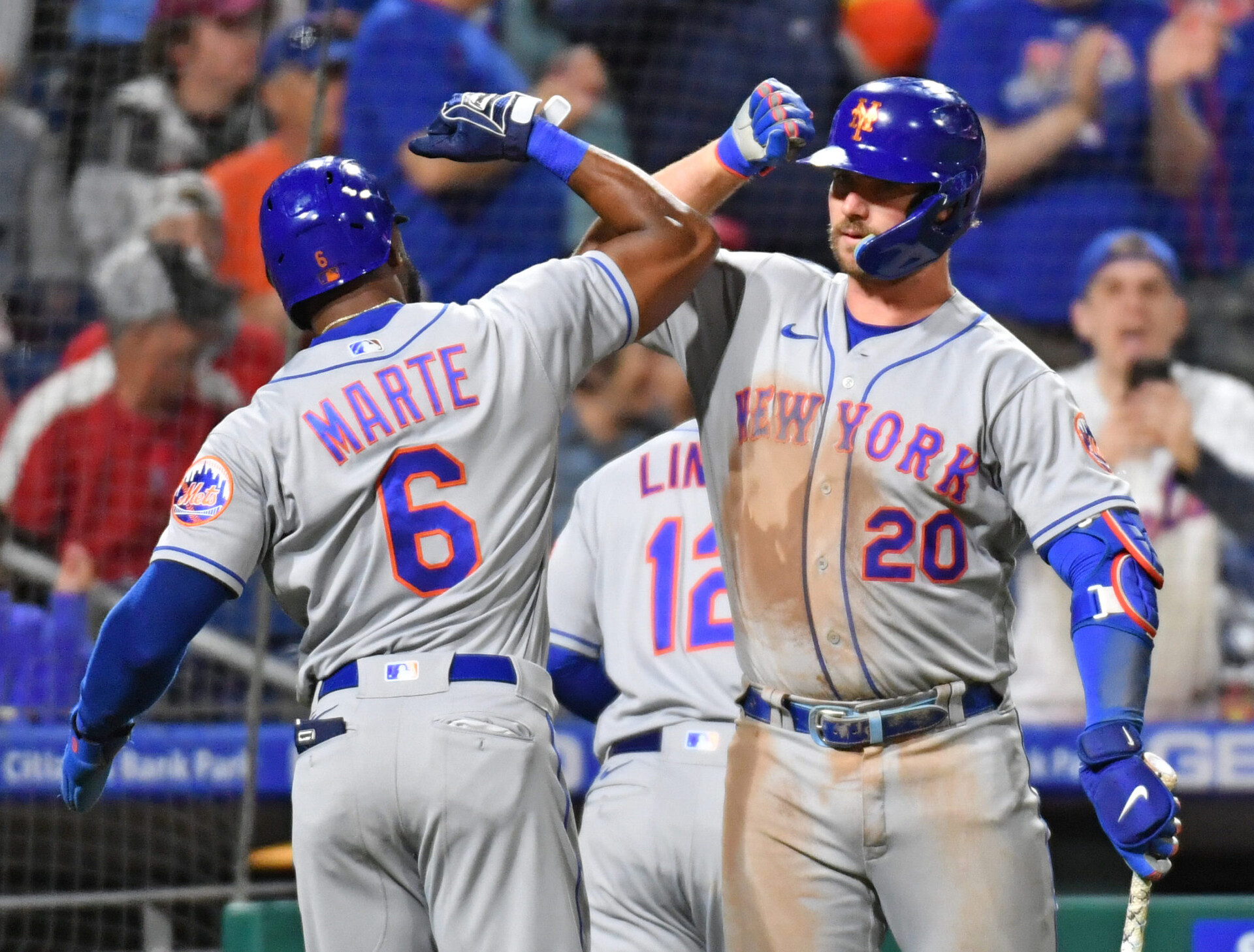 The New York Mets' Starling Marte, right, and Pete Alonso, right, celebrate against the Philadelphia Phillies during the ninth inning at Citizens Bank Park on Thursday, May 5, 2022.
