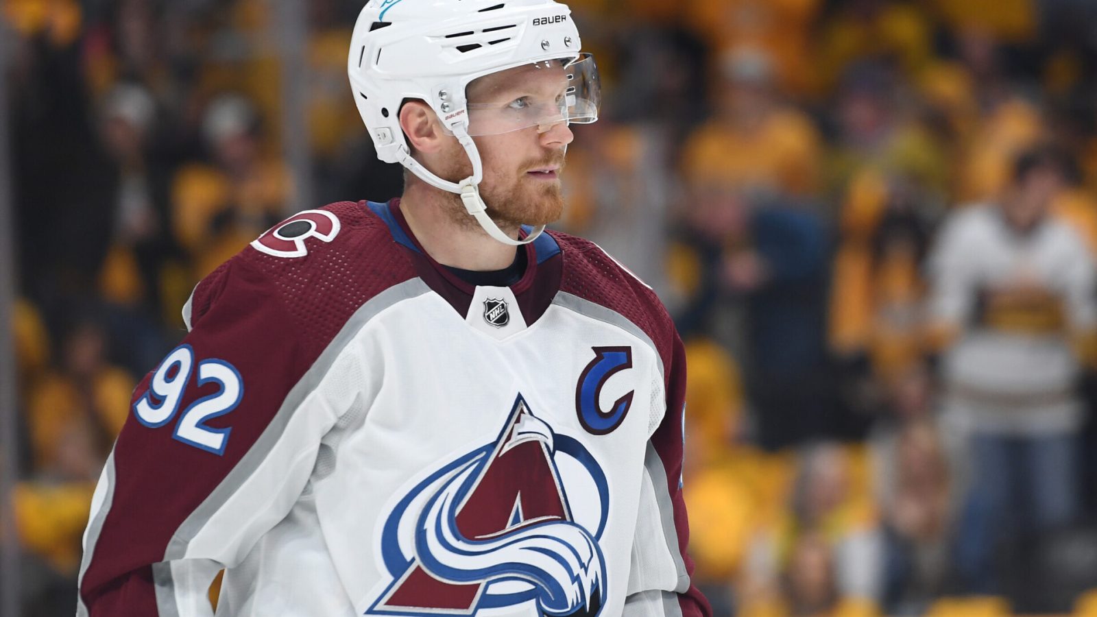 Colorado Avalanche left wing Gabriel Landeskog pauses and looks to his left during a break against against the Nashville Predators in a 2022 Stanley Cup Playoffs game