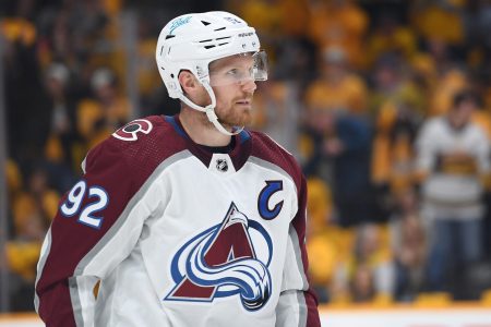 Colorado Avalanche left wing Gabriel Landeskog pauses and looks to his left during a break against against the Nashville Predators in a 2022 Stanley Cup Playoffs game