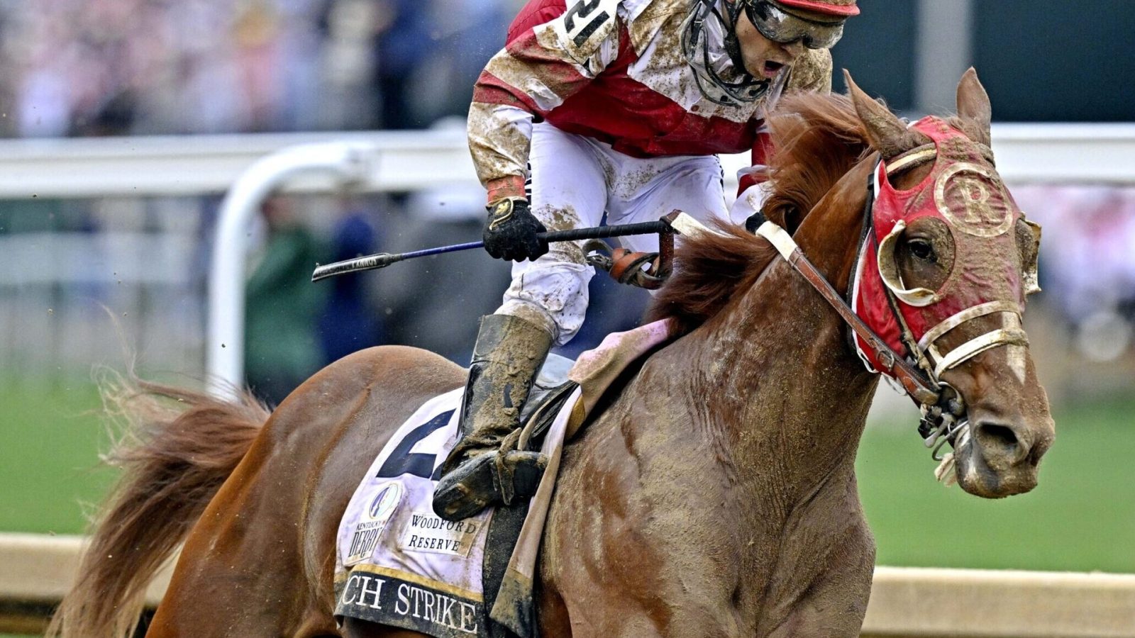 Sonny Leon aboard Rich Strike celebrates winning the 148th running of the Kentucky Derby at Churchill Downs on May 7, 2022.