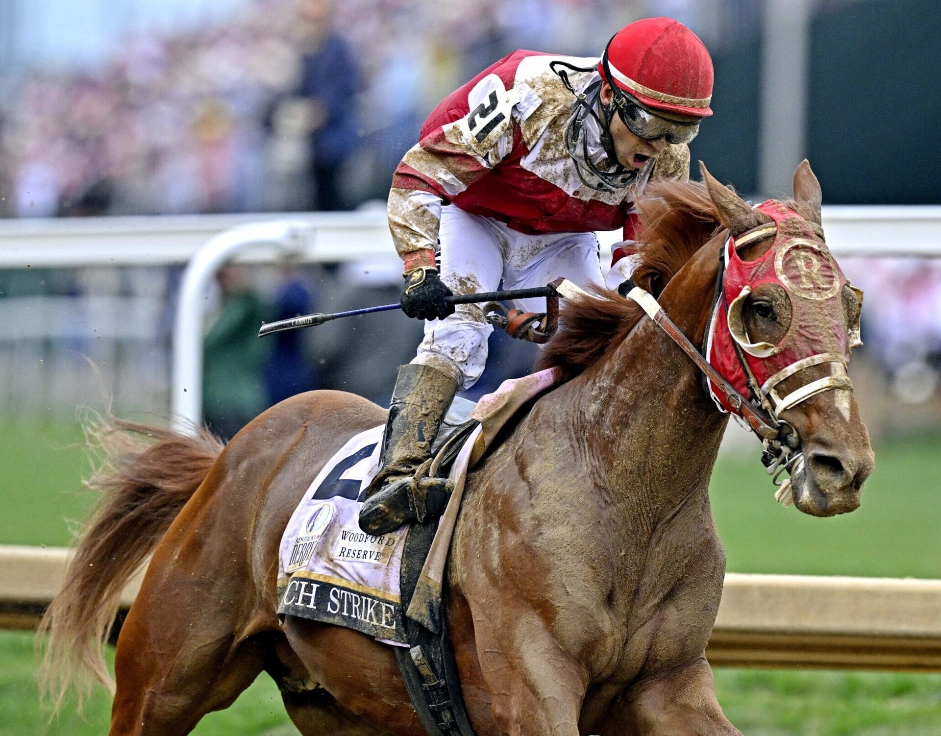 Sonny Leon aboard Rich Strike celebrates winning the 148th running of the Kentucky Derby at Churchill Downs on May 7, 2022.