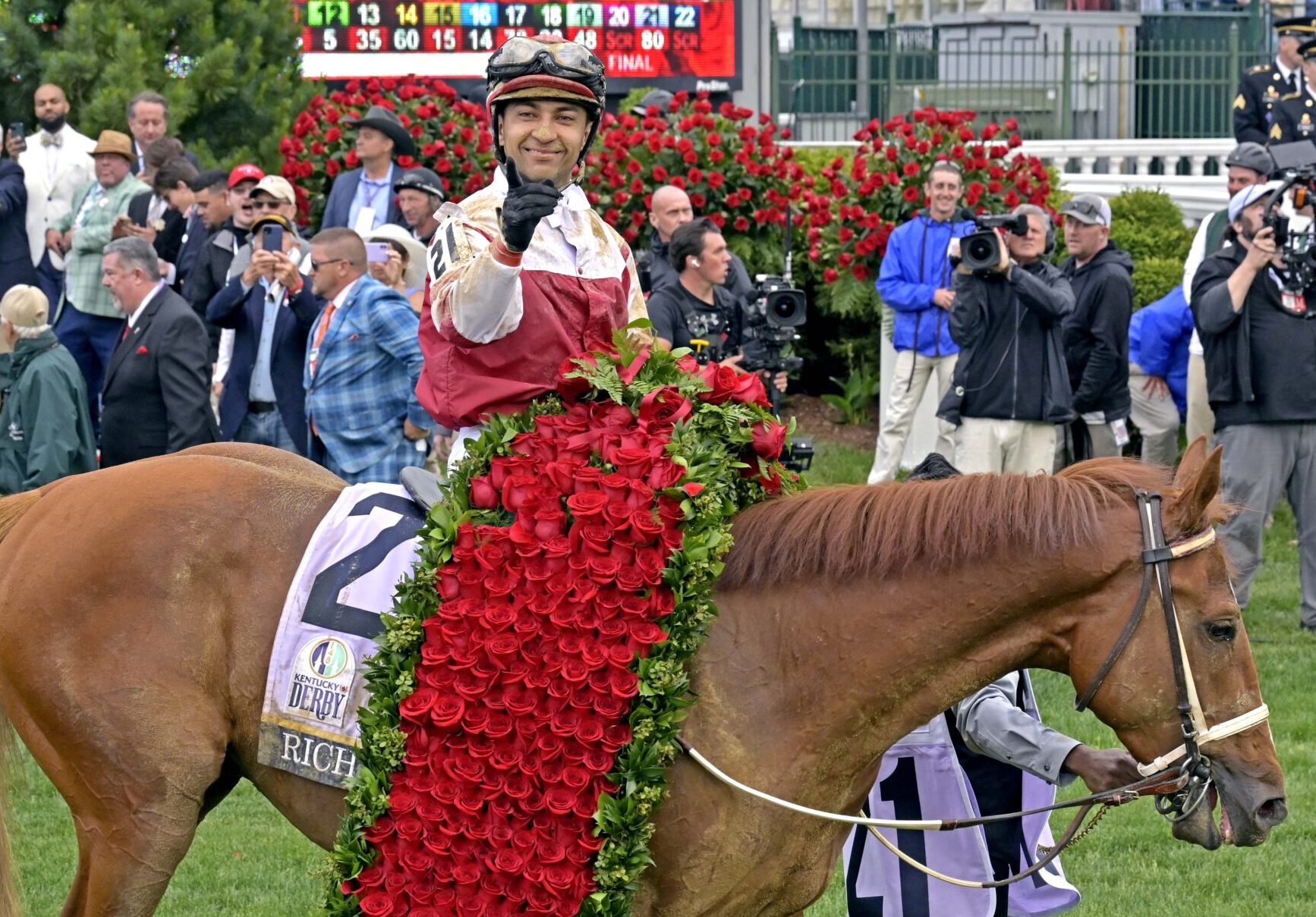 Sonny Leon aboard Rich Strike celebrates winning the 148th running of the Kentucky Derby at Churchill Downs on May 7, 2022.