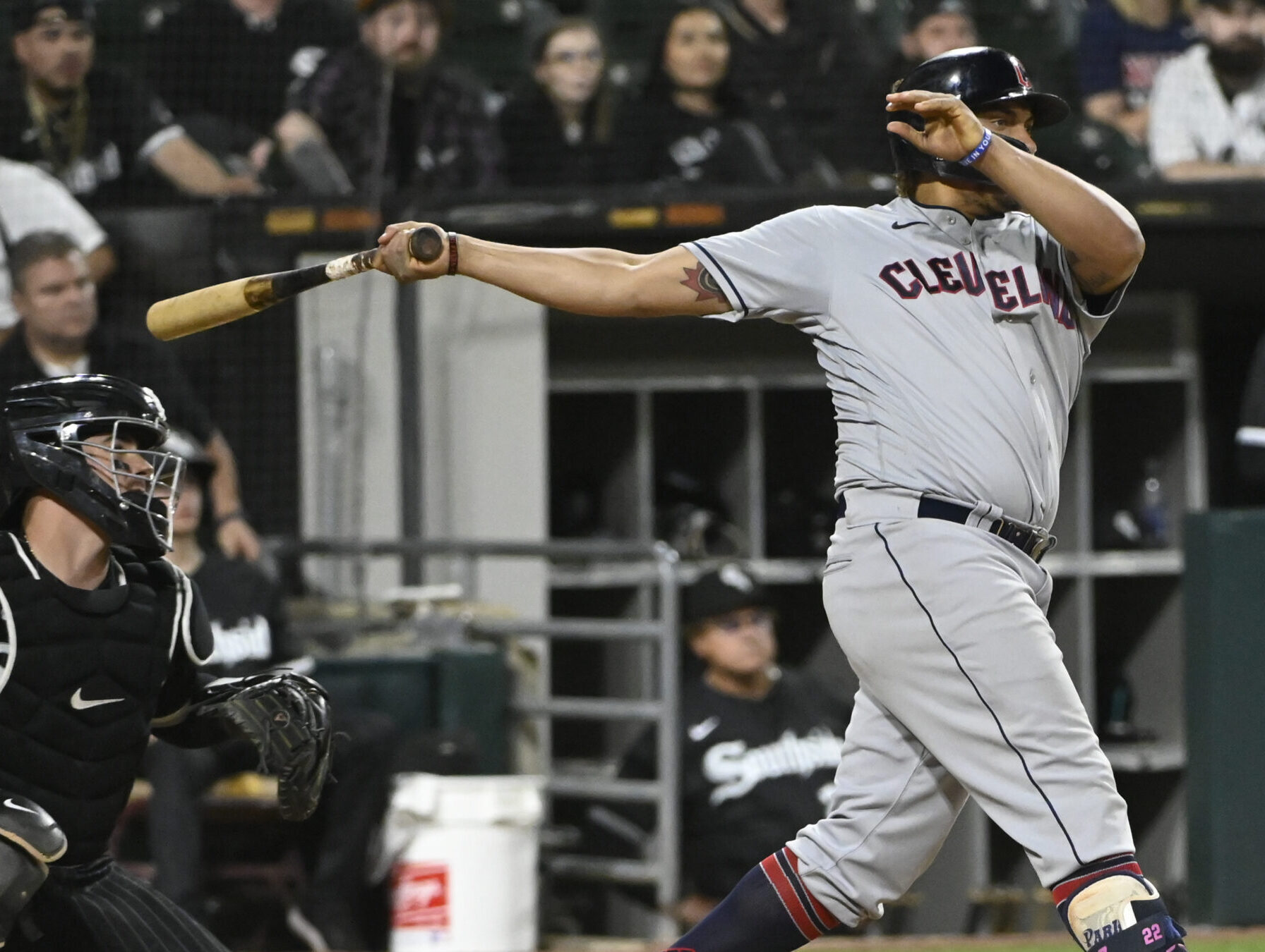 Cleveland Guardians right fielder Josh Naylor follows through on his swing after launching a three-run home run in the 11th inning against the Chicago White Sox
