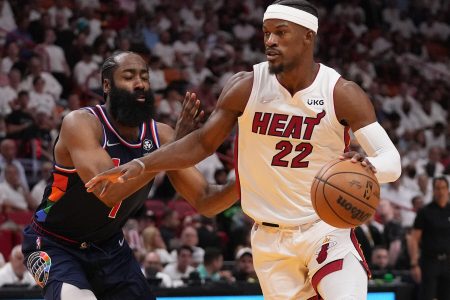 Miami Heat forward Jimmy Butler, right, drives the ball around Philadelphia 76ers guard James Harden, left, during the second half in game five of the second round for the 2022 NBA playoffs at FTX Arena on May 10, 2022.