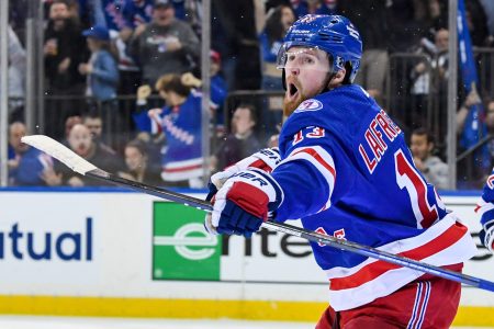 New York Rangers left wing Alexis Lafreniere shouts as he celebrates his goal against the Pittsburgh Penguins during a 2022 Stanley Cup Playoffs game