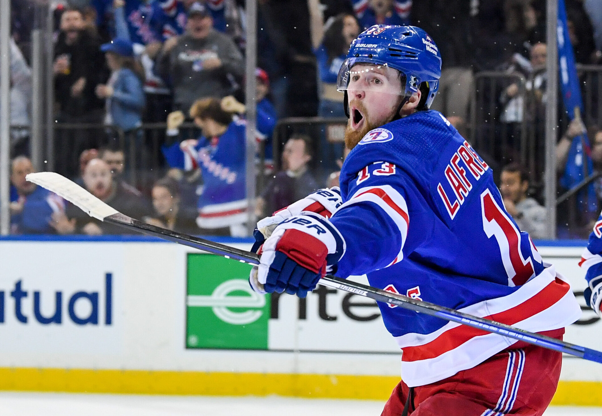 New York Rangers left wing Alexis Lafreniere shouts as he celebrates his goal against the Pittsburgh Penguins during a 2022 Stanley Cup Playoffs game