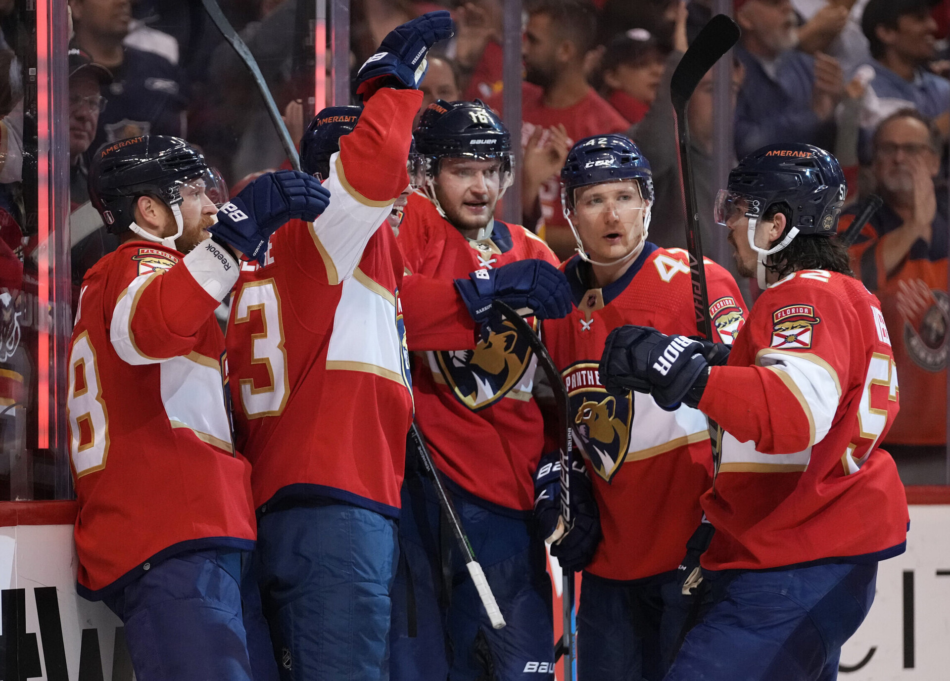 Florida Panthers center Carter Verhaeghe (middle) celebrates his goal against the Washington Capitals with teammates during a 2022 Stanley Cup Playoffs game
