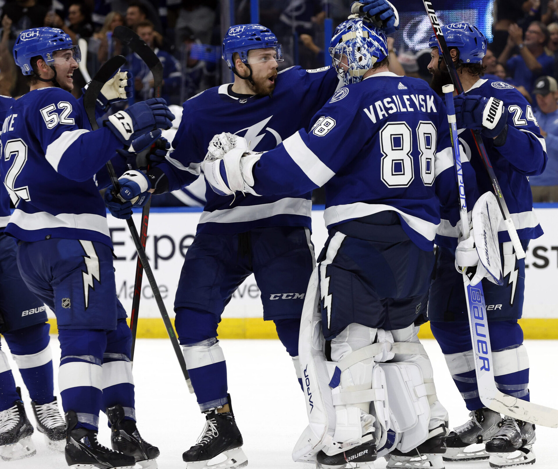 Tampa Bay Lightning goaltender Andrei Vasilevskiy (88), defenseman Zach Bogosian (24), defenseman Erik Cernak (81), defenseman Cal Foote (52) celebrate after defeating the Toronto Maple Leafs in overtime in a 2022 Stanley Cup Playoffs game