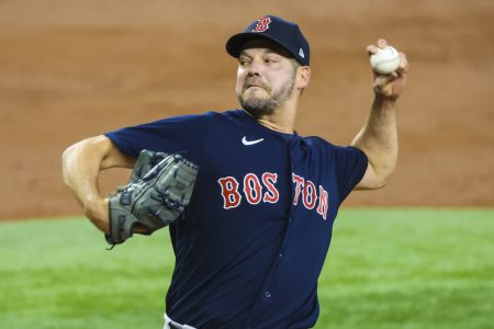 Boston Red Sox left-handed pitcher Rich Hill throws against the Texas Rangers on May 14, 2022, in Arlington, Texas.