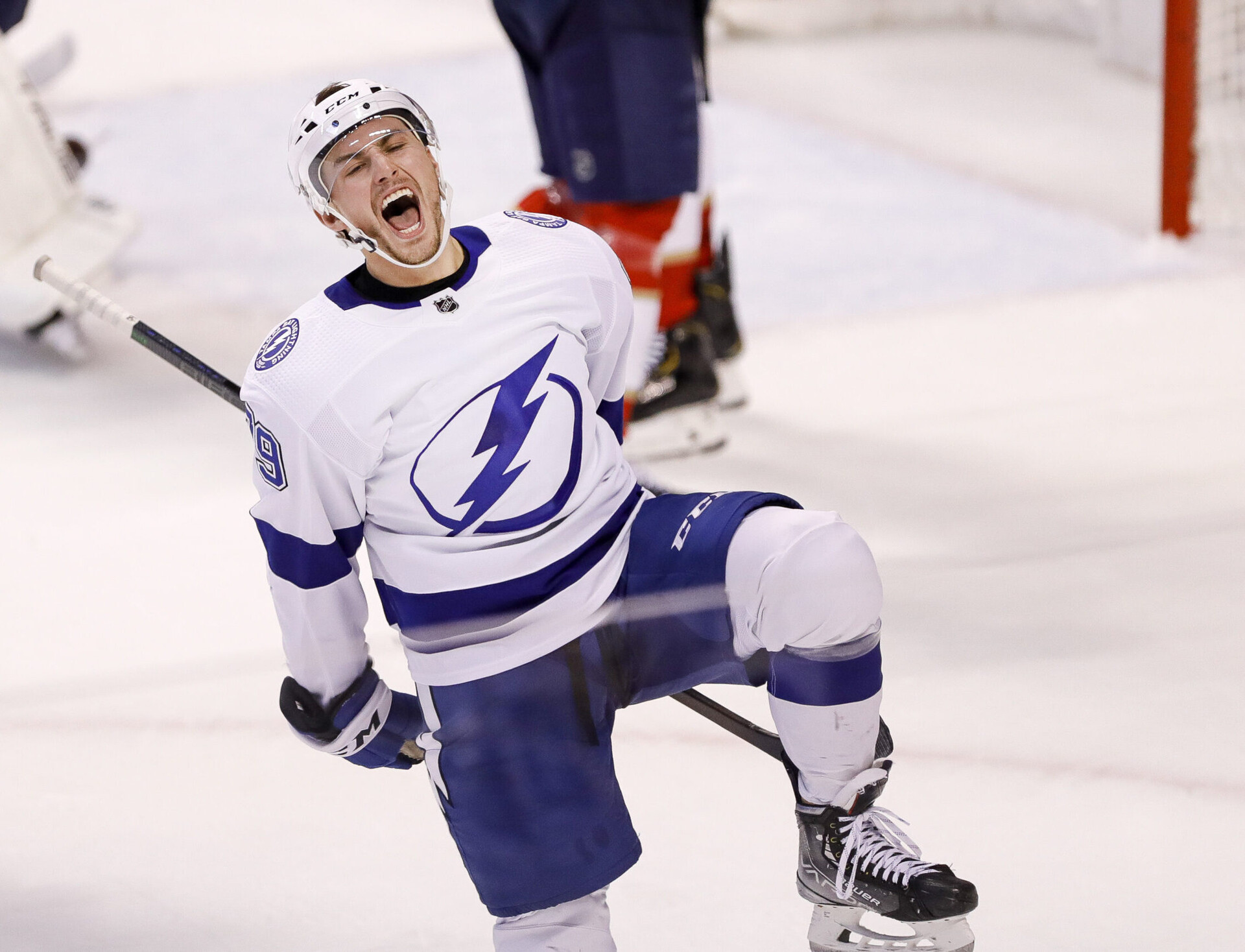 Tampa Bay Lightning center Ross Colton shouts in celebration after scoring during the third period against the Florida Panthers in game one of the second round of the 2022 Stanley Cup Playoffs