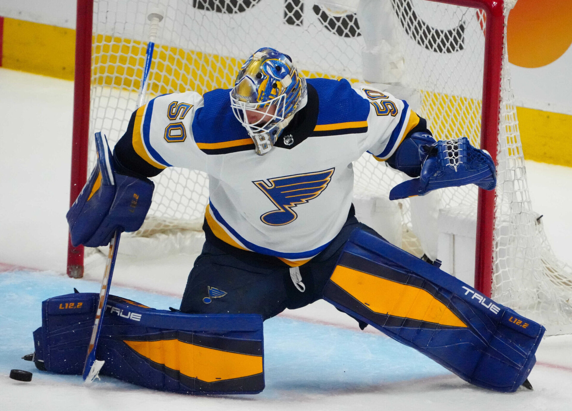 St. Louis Blues goaltender Jordan Binnington makes a save of the puck against the Colorado Avalanche in overtime in game one of the second round of the 2022 Stanley Cup Playoffs