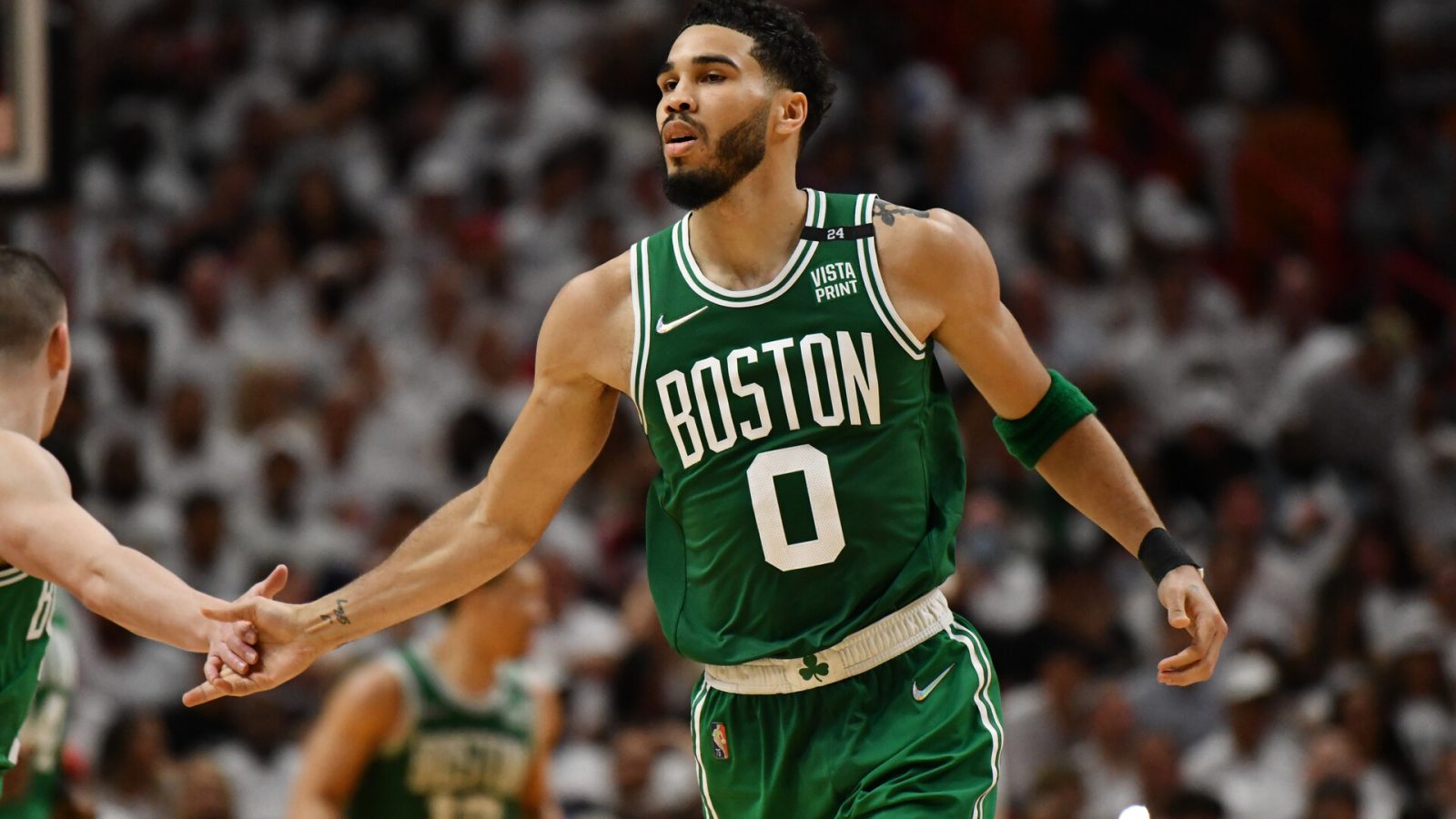 Boston Celtics forward Jayson Tatum (0) celebrates after a basket during the second half of game two of the 2022 eastern conference finals against the Miami Heat at FTX Arena.