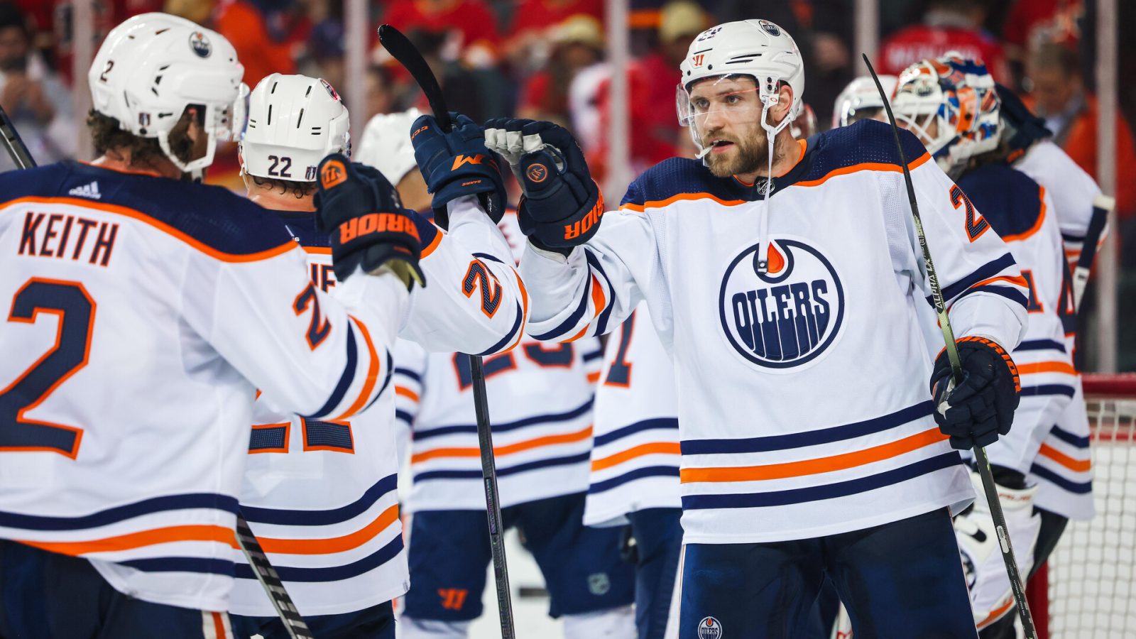 Edmonton Oilers center Leon Draisaitl (right) celebrate win with teammates after defeating the Calgary Flames in Game 2 of the second round of the 2022 Stanley Cup Playoffs