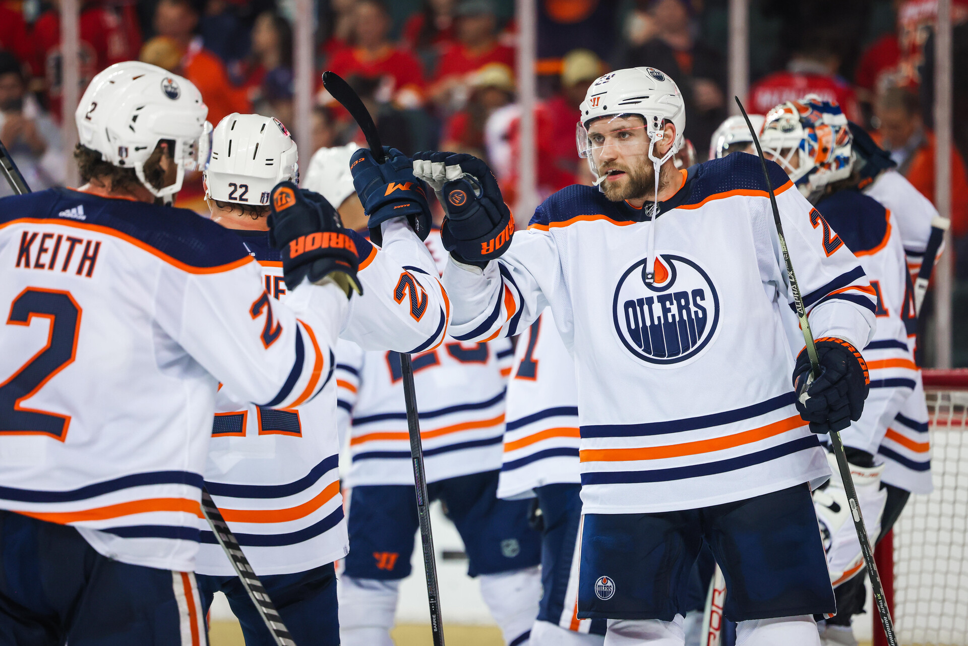 Edmonton Oilers center Leon Draisaitl (right) celebrate win with teammates after defeating the Calgary Flames in Game 2 of the second round of the 2022 Stanley Cup Playoffs