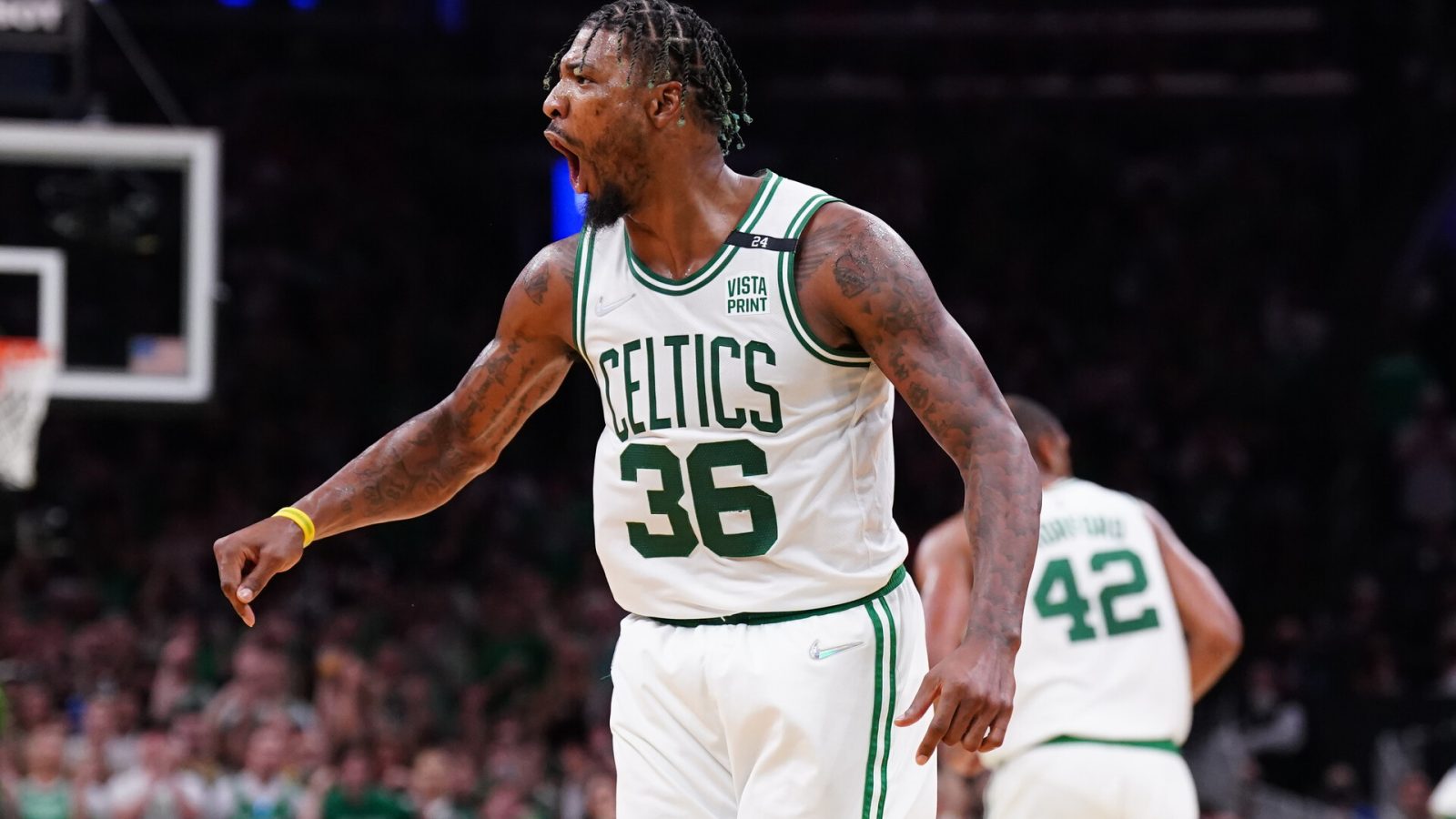 Boston Celtics guard Marcus Smart (36) reacts after a play against the Miami Heat in the third quarter during game three of the 2022 eastern conference finals at TD Garden.