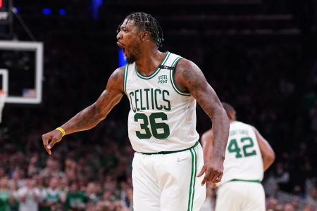 Boston Celtics guard Marcus Smart (36) reacts after a play against the Miami Heat in the third quarter during game three of the 2022 eastern conference finals at TD Garden.