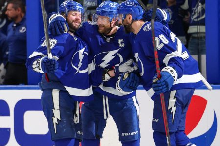 Tampa Bay Lightning right wing Nikita Kucherov (left) celebrates with teammates Steven Stamkos (center) and Paul Nicholas (right) after scoring a goal against the Florida Panthers in Game 3 of the second round of the 2022 Stanley Cup Playoffs