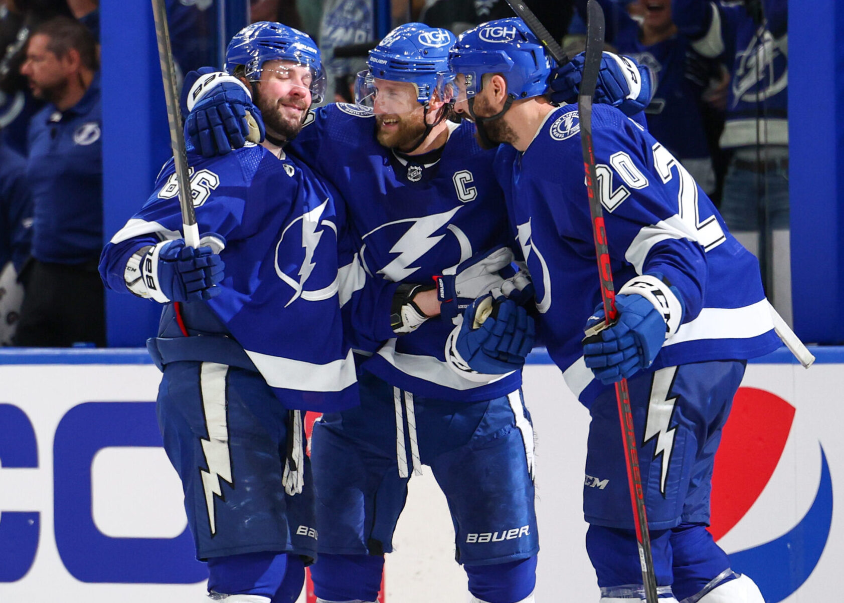 Tampa Bay Lightning right wing Nikita Kucherov (left) celebrates with teammates Steven Stamkos (center) and Paul Nicholas (right) after scoring a goal against the Florida Panthers in Game 3 of the second round of the 2022 Stanley Cup Playoffs