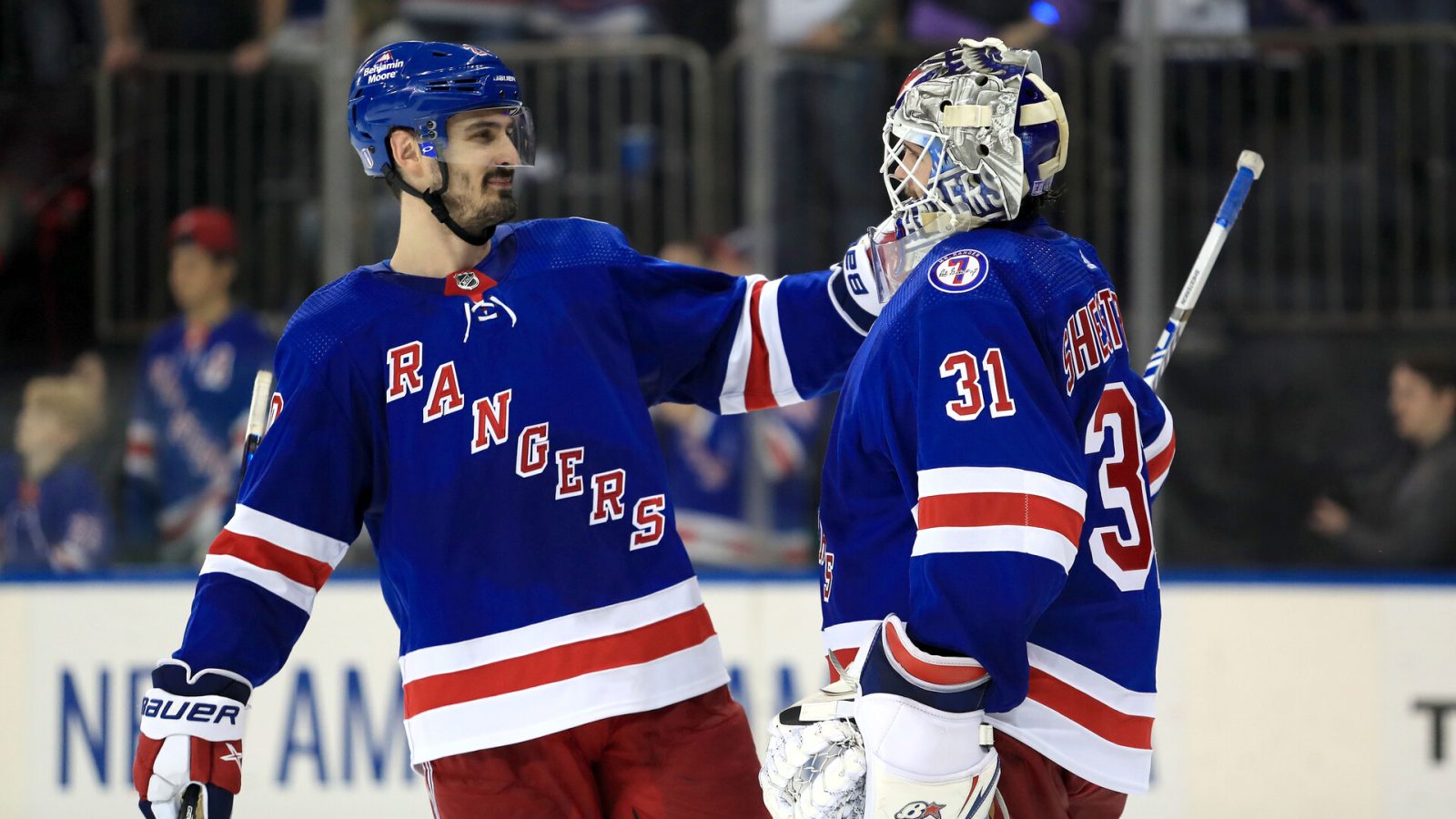 New York Rangers left wing Chris Kreider (left) celebrates a 3-1 win over the Carolina Hurricanes with New York Rangers goalie Igor Shesterkin (right) in Game 3 of the second round of the 2022 Stanley Cup Playoffs