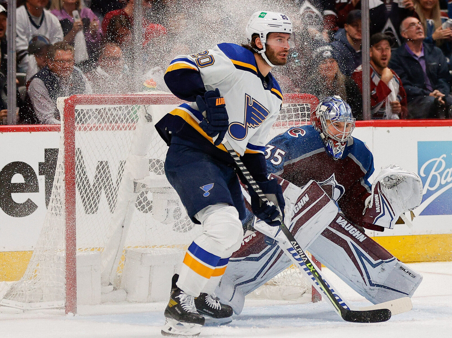 St. Louis Blues left wing Brandon Saad (left) sets up in front of Colorado Avalanche goaltender Darcy Kuemper (right) in Game 5 of the second round of the 2022 Stanley Cup Playoffs