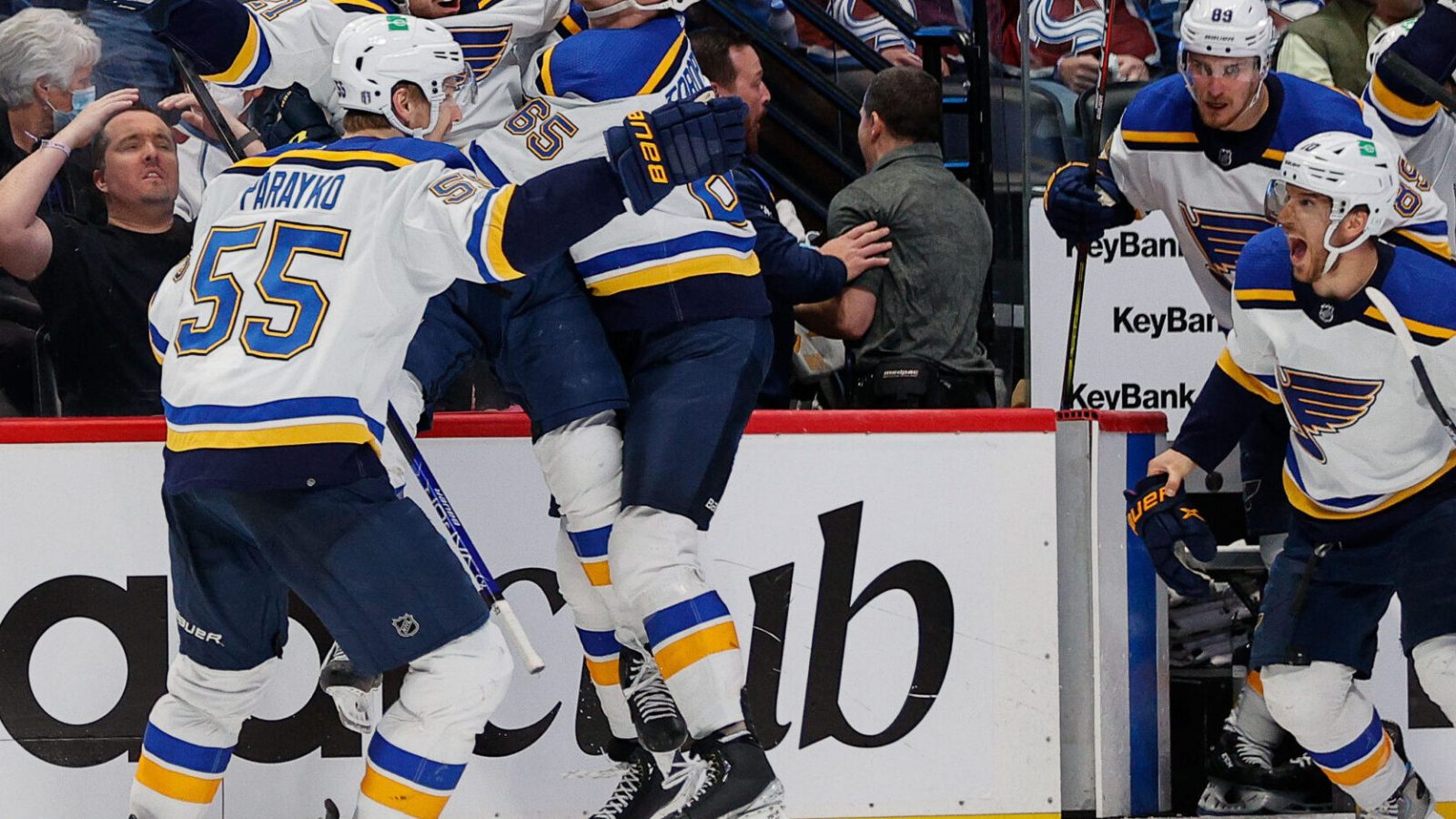 St. Louis Blues players smother center Tyler Bozak (center) after his game-winning overtime goal against the Colorado Avalanche in Game 5 of the second round of the 2022 Stanley Cup Playoffs