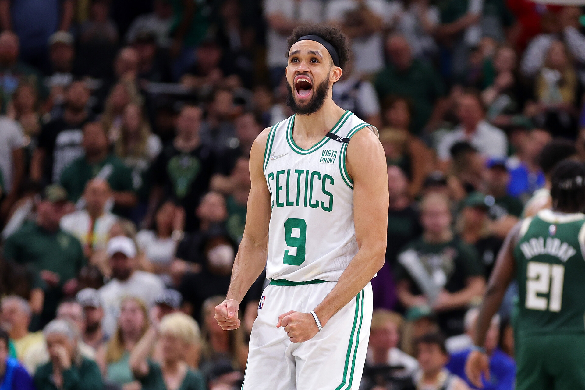 Derrick White #9 of the Boston Celtics reacts to a three point shot against the Milwaukee Bucks during the second half of Game Six of the Eastern Conference Semifinals at Fiserv Forum on May 13, 2022 in Milwaukee, Wisconsin.