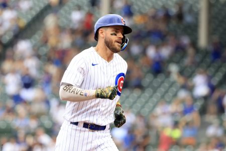 Patrick Wisdom #16 of the Chicago Cubs runs the bases after hitting a homerun during the second inning in the game against the Arizona Diamondbacks at Wrigley Field on May 20, 2022 in Chicago, Illinois.