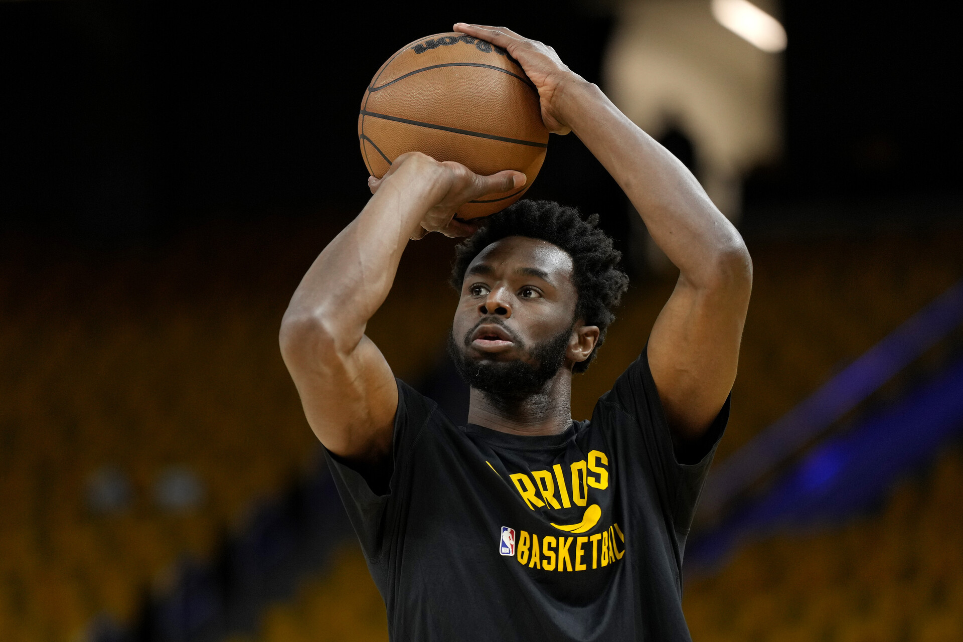 Andrew Wiggins #22 of the Golden State Warriors warms up prior to Game Five of the 2022 NBA Playoffs Western Conference Finals against the Dallas Mavericks at Chase Center on May 26, 2022 in San Francisco, California.