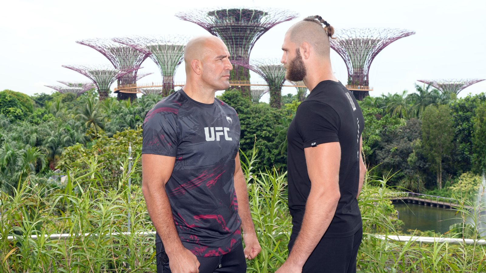 UFC light heavyweight champion Glover Texeira of Brazil and Jiri Prochazka of Czech Republic face off during a UFC photo session at Gardens by the Bay on June 7, 2022 in Singapore.