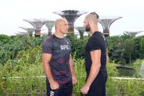 UFC light heavyweight champion Glover Texeira of Brazil and Jiri Prochazka of Czech Republic face off during a UFC photo session at Gardens by the Bay on June 7, 2022 in Singapore.