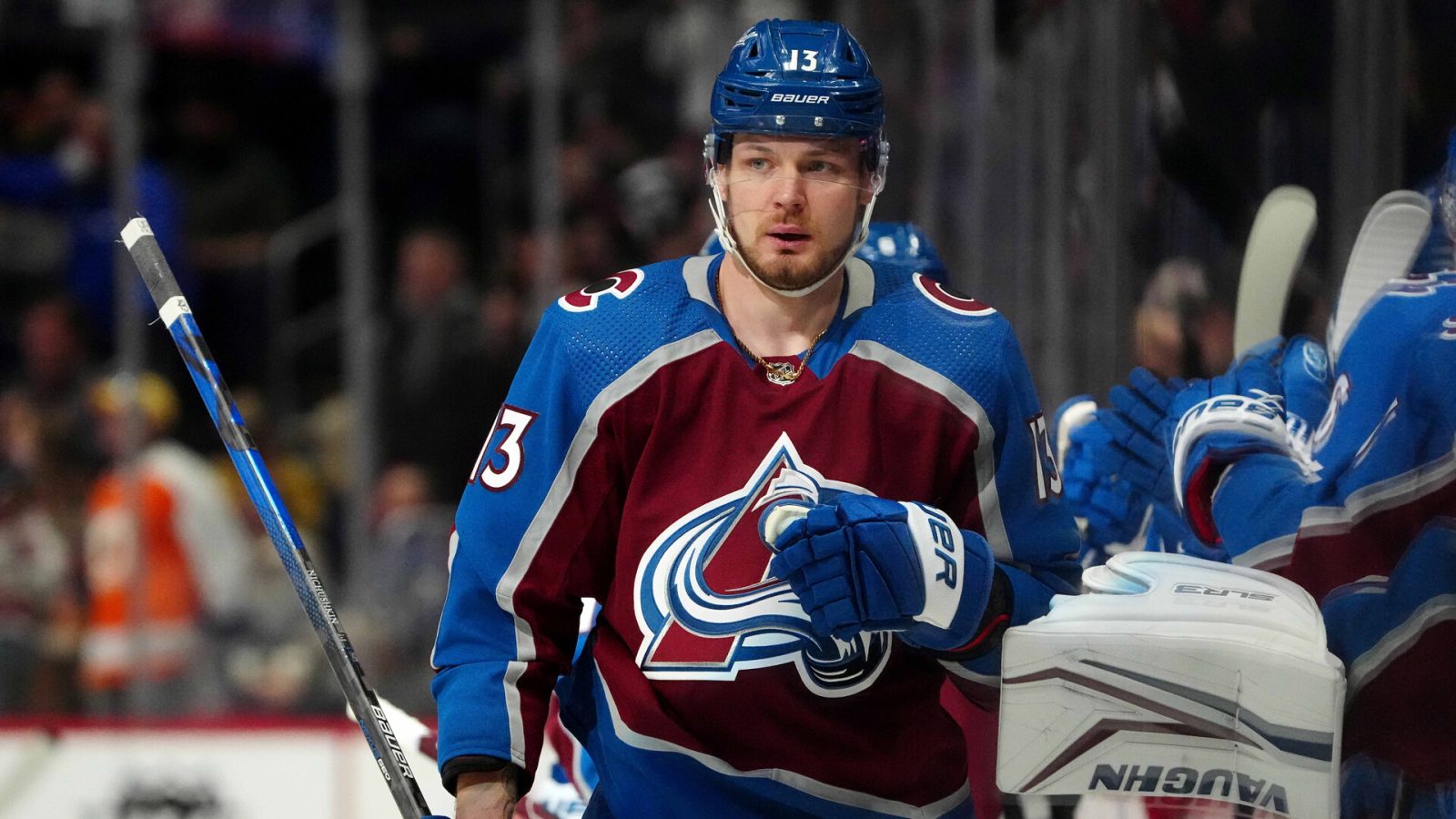 Colorado Avalanche right wing Valeri Nichushkin (13) celebrates an assist for a score against the Calgary Flames at Ball Arena.