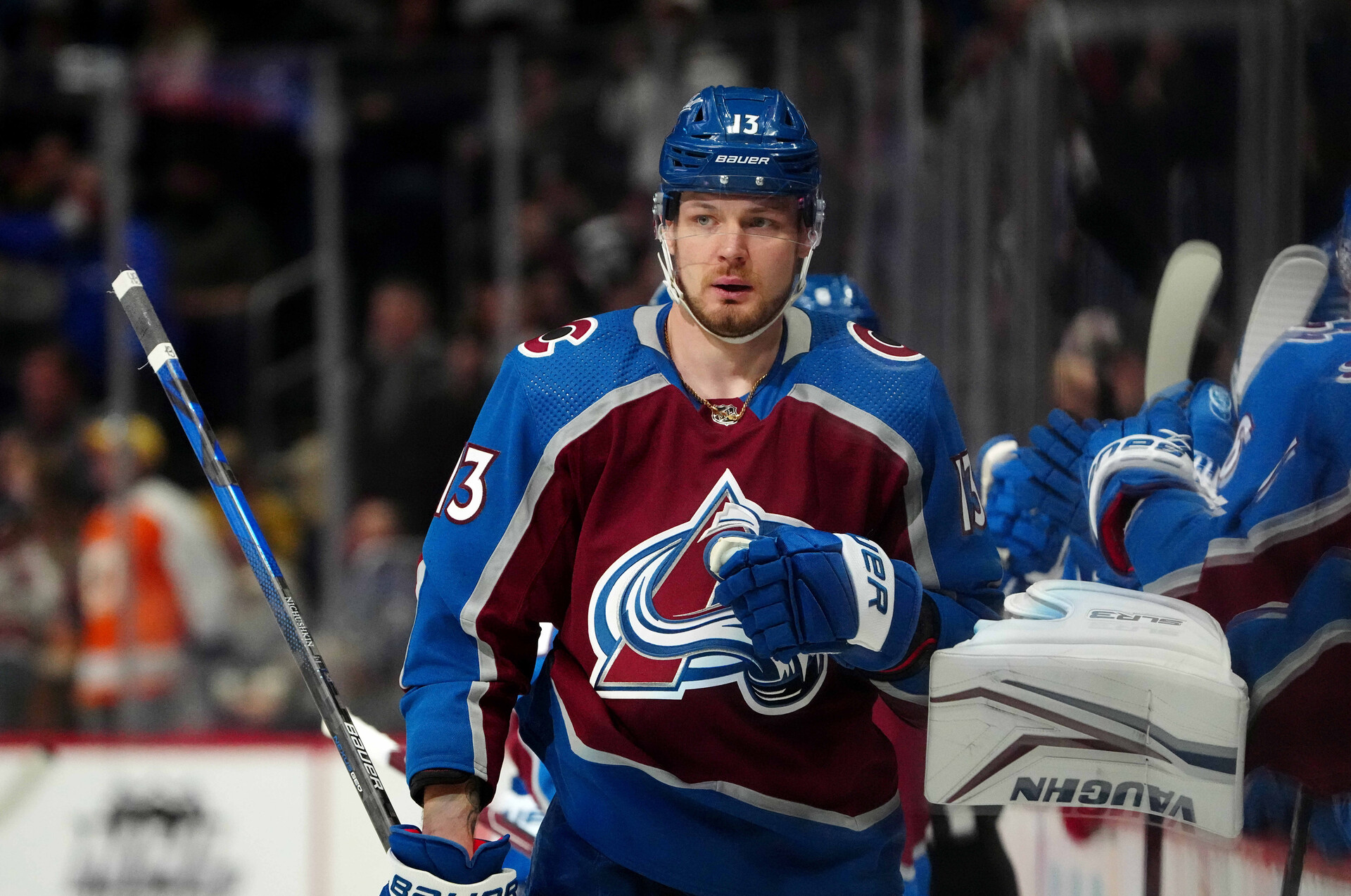 Colorado Avalanche right wing Valeri Nichushkin (13) celebrates an assist for a score against the Calgary Flames at Ball Arena.