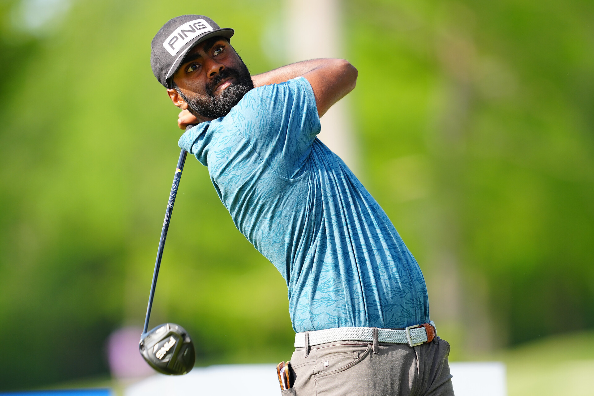 Sahith Theegala plays from the 13th tee
