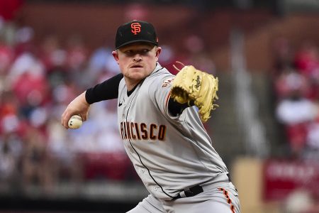 San Francisco Giants starting pitcher Logan Webb (62) pitches against the St. Louis Cardinals during the first inning at Busch Stadium.