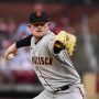 San Francisco Giants starting pitcher Logan Webb (62) pitches against the St. Louis Cardinals during the first inning at Busch Stadium.